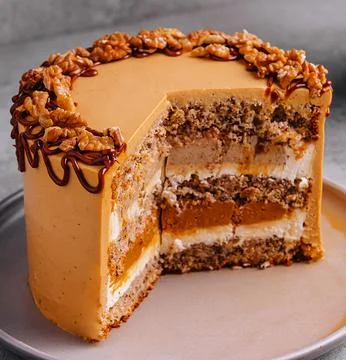 Fancy layered walnut cake with caramel Stock Photos