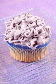 Fancy light purple cupcake Stock Photos