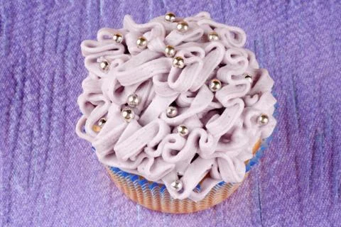 Fancy light purple cupcake Stock Photos