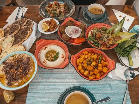 Fancy Middle Eastern breakfast, baked Flatbread - appetizers - Levantine cuisine Stock Photos