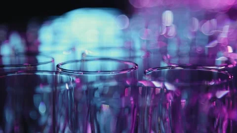 Fancy patterns from glasses standing on the table in the festive hall Stock Footage 259296761