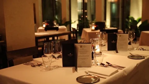 Fancy restaurant table evening Stock Footage 77604146