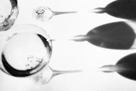 Fancy retro drinking glasses and shadows Stock Photos