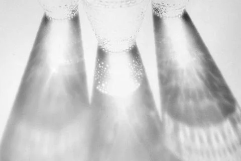 Fancy retro drinking glasses and shadows Stock Photos