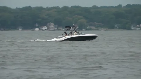 Fancy Ski Boat Distant Shot Moderate Speed Stock Footage 201110310