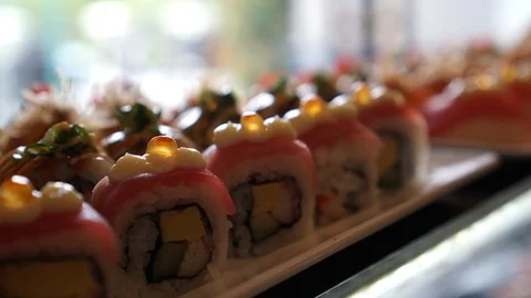 Fancy sushi rolls buffet in row 4k Stock Footage 101336597