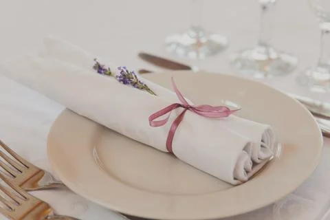 Fancy violet table set for a wedding dinner Stock Photos