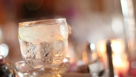 Fancy water glass set at table tilt left and right Vídeo Stock 11134848