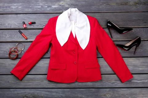 Fancy white blouse, jacket and make-up accessories. Stock Photos