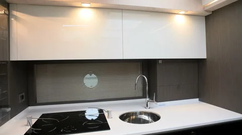 Fancy white kitchen on lower deck of a boat Stock Footage 62573793