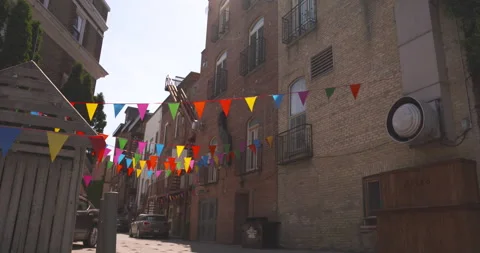 Fanions hanging in a laneway Stock Footage 133698778