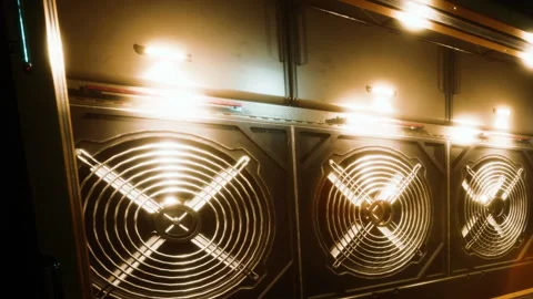 Fans and lights located in a dim space at night Stock Footage 342045981