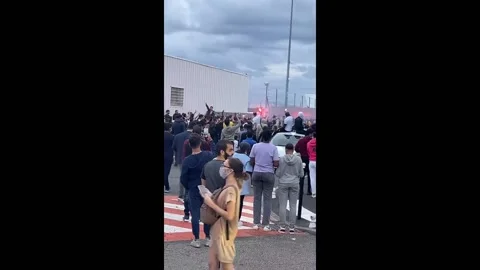 Fans are waiting for Leonel Messi at the airport in Paris, France 動画素材 170456321