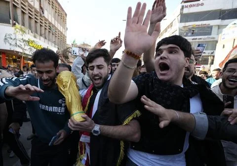 Fans in Baghdad react to their team qualifying for the FIFA World Cup 2026, Iraq Stock Photos