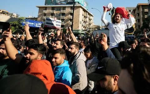 Fans in Baghdad react to their team qualifying for the FIFA World Cup 2026, Iraq Stock Photos