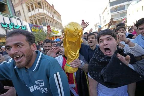 Fans in Baghdad react to their team qualifying for the FIFA World Cup 2026, Iraq Stock Photos