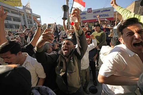 Fans in Baghdad react to their team qualifying for the FIFA World Cup 2026, Iraq Stock Photos