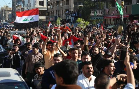 Fans in Baghdad react to their team qualifying for the FIFA World Cup 2026, Iraq Stock Photos