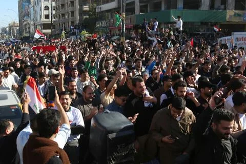 Fans in Baghdad react to their team qualifying for the FIFA World Cup 2026, Iraq Stock Photos