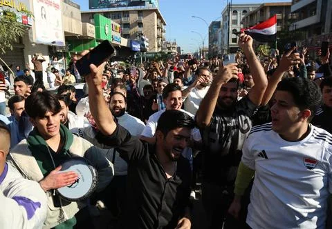 Fans in Baghdad react to their team qualifying for the FIFA World Cup 2026, Iraq Stock Photos