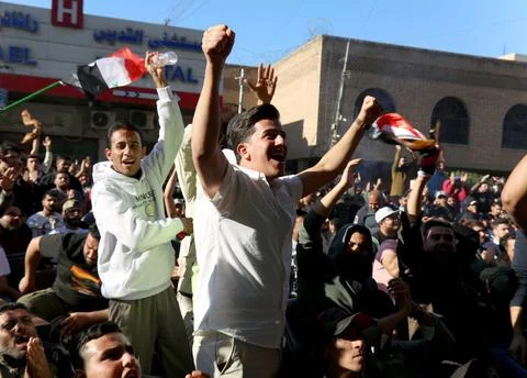 Fans in Baghdad react to their team qualifying for the FIFA World Cup 2026, Iraq Stock Photos