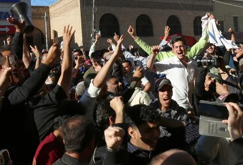 Fans in Baghdad react to their team qualifying for the FIFA World Cup 2026, Iraq Stock Photos