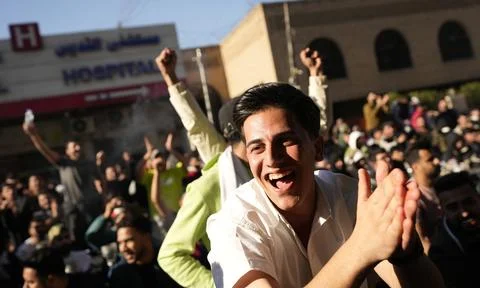 Fans in Baghdad react to their team qualifying for the FIFA World Cup 2026, Iraq Stock Photos