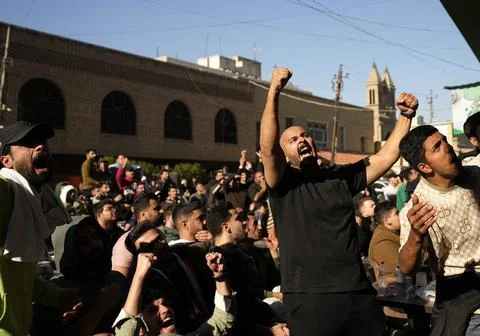 Fans in Baghdad react to their team qualifying for the FIFA World Cup 2026, Iraq Stock Photos