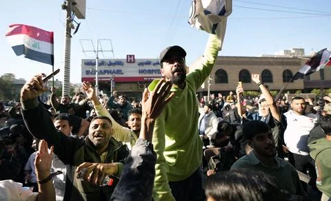 Fans in Baghdad react to their team qualifying for the FIFA World Cup 2026, Iraq Stock Photos