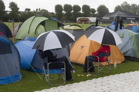 Fans Camping In The Rain To Be First In The Queue For The Start Of Wimbledon For Stock Photos