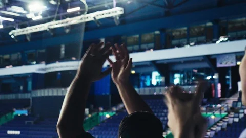 Fans clap hands at competitions on stadium slow motion Stock Footage 118767729