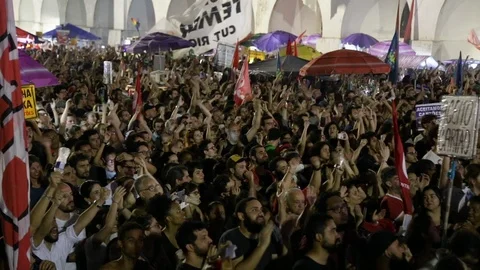 Fans clapping their hands during a manifestation with Fernando Haddad Video stock 97394860