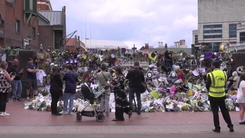 Fans continue to leave tributes to Black Sabbath singer Ozzy Osborne in Birming Stock Footage 313884071