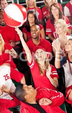 Fans: crowd plays with beach ball Stock Photos