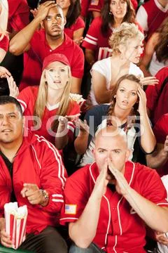 Fans: crowd reacts badly to losing team Stock Photos