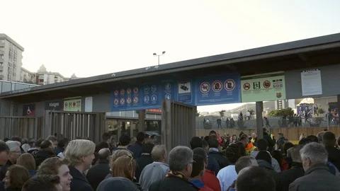Fans enter stadium Camp Nou to watch soccer game, Barcelona, Spain. Video stock 127470150