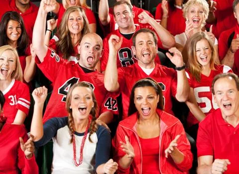 Fans: excited crowd cheering for team Stock Photos