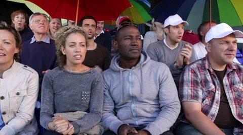 Fans follow olympics track race event or watching gol, rugby, American football Stock Footage