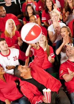 Fans: having fun with a beach ball Stock Photos