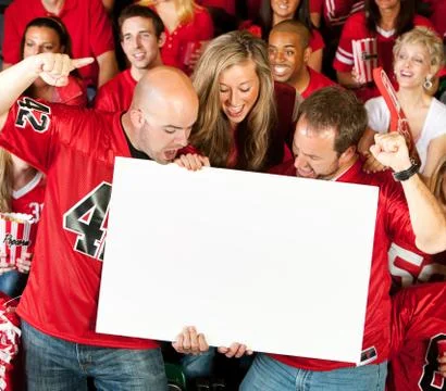 Fans: men looking down at blank sign Stock Photos