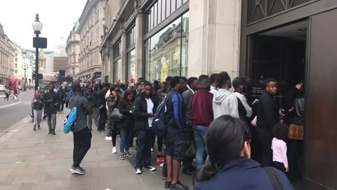 Fans queue for Nigeria World Cup kit on Oxford Street Video stock 148621000