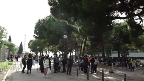 Fans queue outside Barcelona's Palau Sant Jordi ahead of Lady Gaga's final shows Stock Footage 320249742