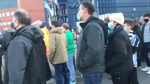 Fans queue outside Hawthorns stadium for West Brom v West Ham clash Stock Footage 154376063