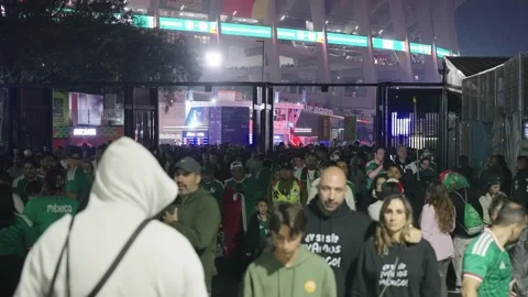 Fans stream out of Estadio Azteca at night Stock Footage 345278489