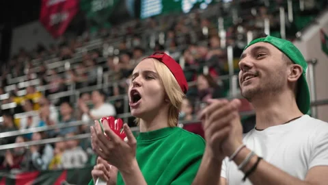 Fans support team. Stadium couple date. Watcher at sport rugby tribune. Win goal Stock Footage 232774314