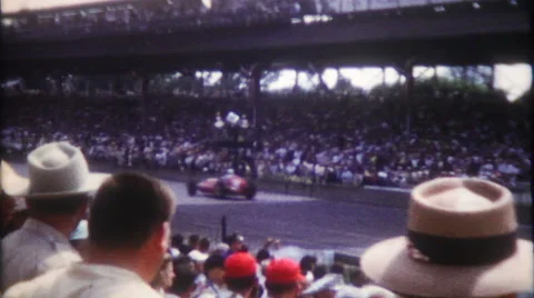Fans watch the Indy 500 finish line 1950s vintage film home movie 1328 Stock Footage