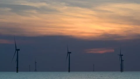 Fans of wind turbines spin over the spar... | Stock Video | Pond5