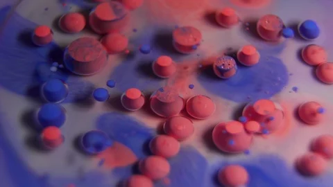 Fantastic abstract paint bubbles moving in slow motion. Chemical reaction of Stock Footage 87233697