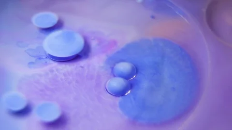 Fantastic abstract paint bubbles moving in slow motion. Chemical reaction of Stock Footage 87233945