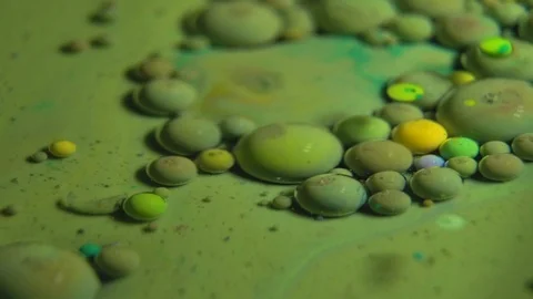 Fantastic abstract paint bubbles moving in slow motion. Chemical reaction of Stock Footage 87234722